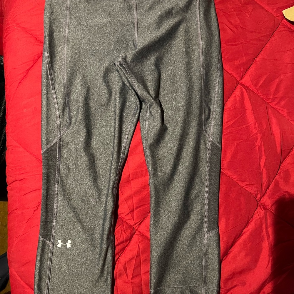 Under Armour charcoal gray Capri pants—size large.